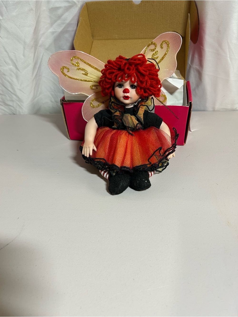 Charisma Red and Black Fairy Costume Doll with Gold-Accent Wings